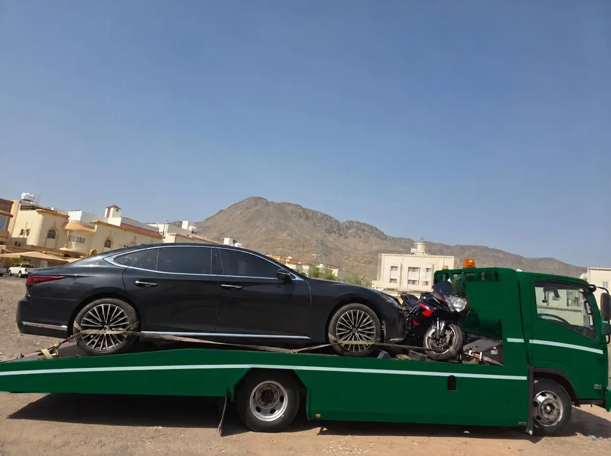 سطحة الطائف — نقل سيارة ودراجة نارية